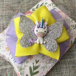 Very cute multiplayer hair bow clip/ elastic